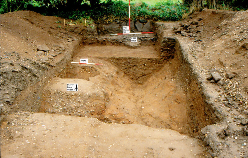 Plate 19. Trench 1 extension, with 1st C. enclosure ditch F133 coming in from lower left and being cut by 2nd C. ditch F143.The posthole F400 centre left belongs to the 17m long row of postholes in Trenches 10-12