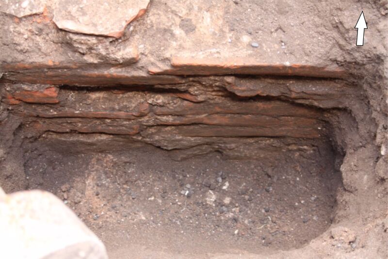 Plate 62. Tegulae wall F4 looking north. It is located below the new manhole, at the junction of trench 3 and trench 2