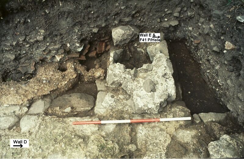 Plate 4. The stonework built around F41 post. Immediately to the left of F41 flue tile debris can be seen.