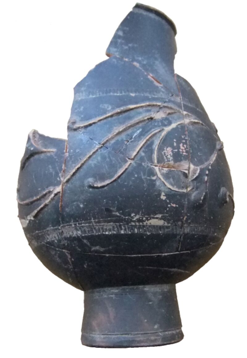 Plate 22. Black Slipped Beaker Black Slipped Beaker from Lezoux Central Gaul. Recovered from the repair debris of the enclosure entrance. 11.8cm high 7.6cm diameter.