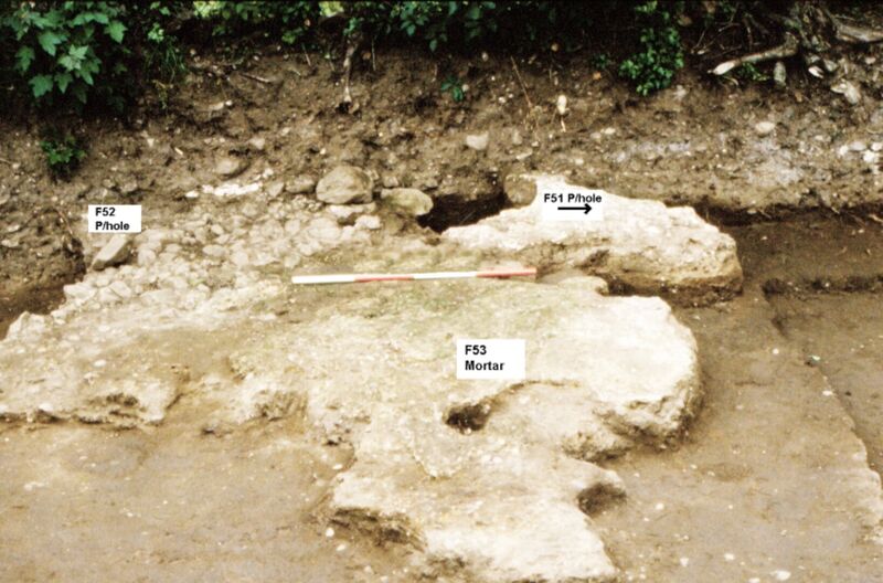 Plate 7. Possible entrance on east wall. The remains of a possible doorway, at the rear two large postholes may be associated with a portico entrance