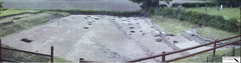 Plate 28. The post holes of a late 1st century building. The wing is far right, ditched enclosure left and bottom left. The late 3rd to 4th century drain cutting through the mortar mixing pit is to the left of the wing, the dark linear stain running diagonally from centre bottom is the first view of Iron Age features, a further light trowel revealed further post holes and other features. See Plate 30